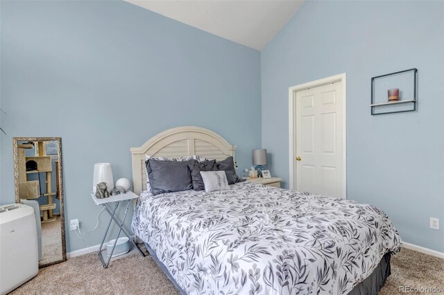4013 S Carson St Unit C, Aurora, CO 80014 - carpeted bedroom with high vaulted ceiling and baseboards