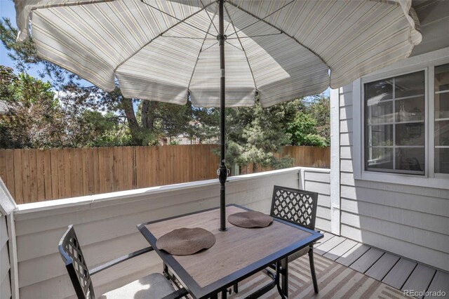 4013 S Carson St Unit C, Aurora, CO 80014 - deck featuring outdoor dining area