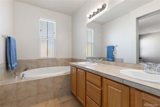 3454 Cascina Pl Unit D, Highlands Ranch, CO 80126 - bathroom with plenty of natural light, a bath, double vanity, and tile patterned flooring
