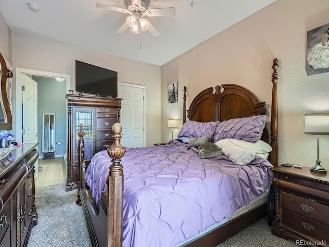 carpeted bedroom with ceiling fan