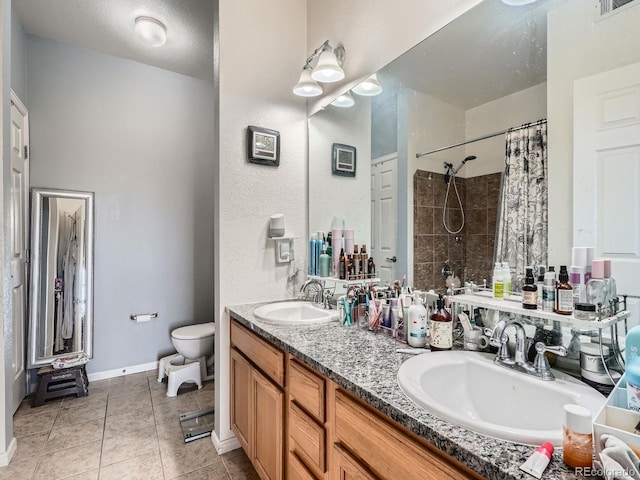 bathroom featuring walk in shower, tile patterned floors, a textured ceiling, toilet, and vanity