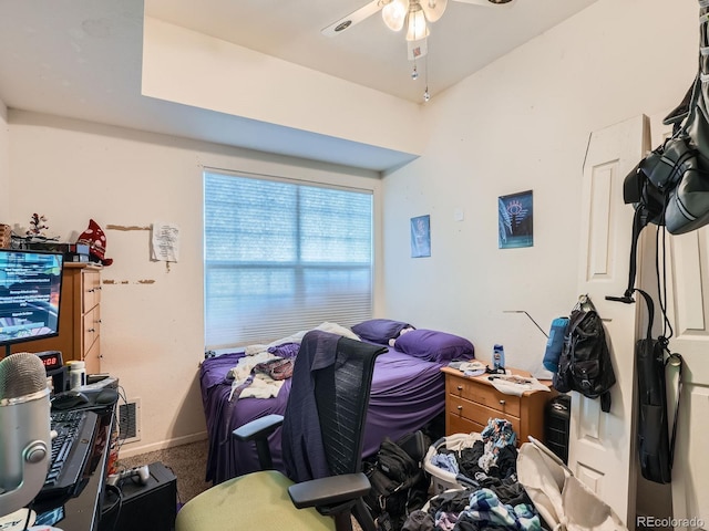 bedroom featuring ceiling fan and carpet floors