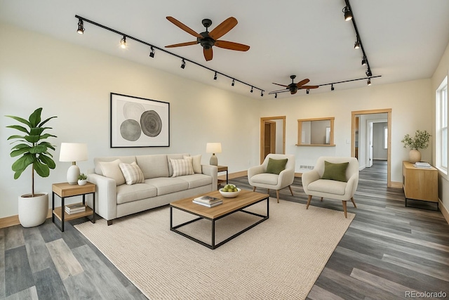 532 Front St, Fairplay, CO 80440 - living area featuring rail lighting, ceiling fan, baseboards, and wood finished floors