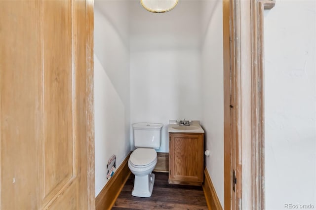 532 Front St, Fairplay, CO 80440 - half bathroom with a sink, toilet, and wood finished floors