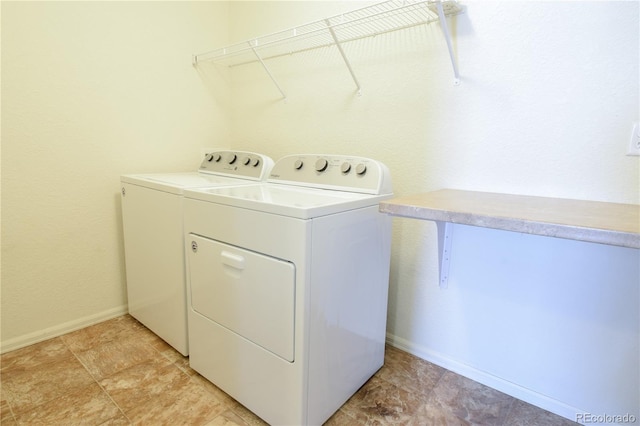 1057 Mt Oxford Ave, Severance, CO 80550 - laundry room with separate washer and dryer and baseboards