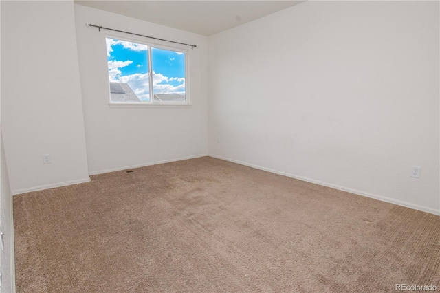 1057 Mt Oxford Ave, Severance, CO 80550 - empty room featuring carpet floors and baseboards