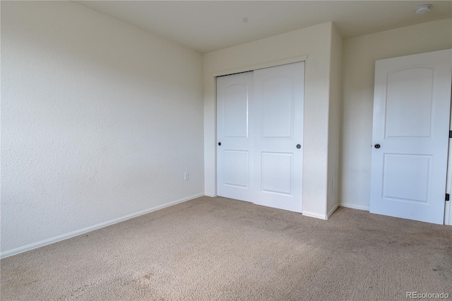 1057 Mt Oxford Ave, Severance, CO 80550 - unfurnished bedroom with carpet and a closet