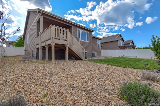 1057 Mt Oxford Ave, Severance, CO 80550 - rear view of property with stairway and a deck