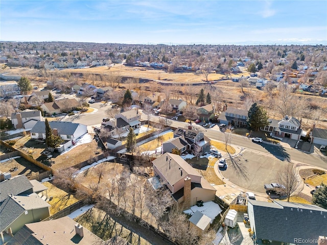 birds eye view of property with a residential view