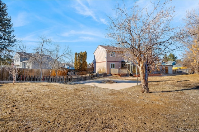 view of yard with fence