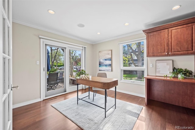 office area with baseboards, a wealth of natural light, ornamental molding, and dark wood-style flooring