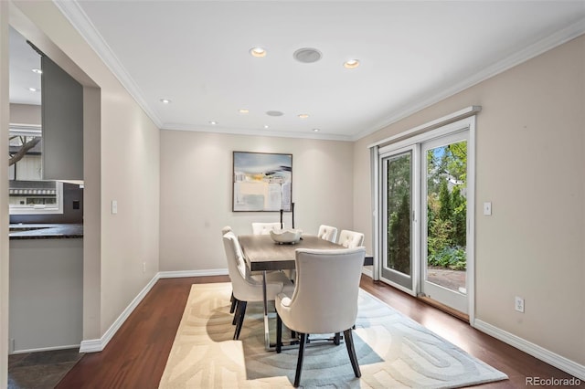 dining area featuring baseboards, dark wood-style flooring, crown molding, and recessed lighting