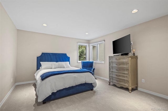 carpeted bedroom with baseboards and recessed lighting