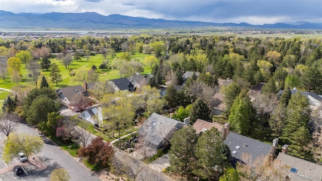 birds eye view of property with a mountain view