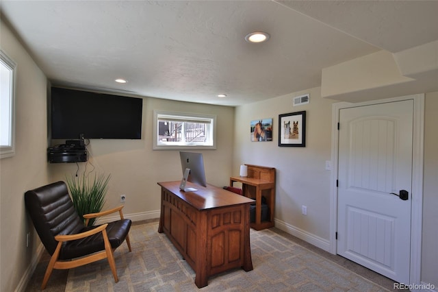 office featuring visible vents, baseboards, and recessed lighting