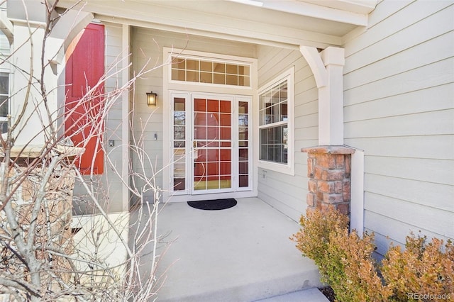 doorway to property featuring a porch