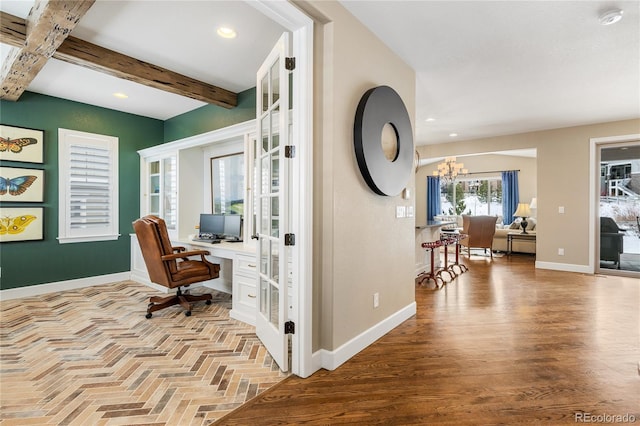 office area with beamed ceiling, recessed lighting, baseboards, and a chandelier