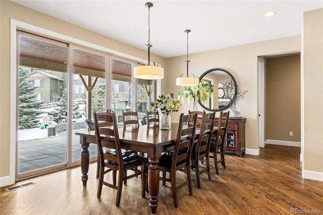 dining room featuring dark hardwood / wood-style floors