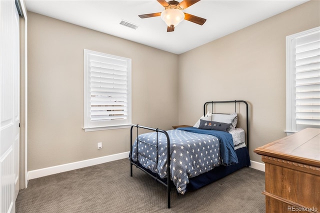 bedroom featuring carpet flooring, ceiling fan, and a closet