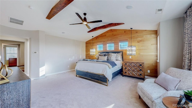 bedroom featuring carpet flooring, multiple windows, visible vents, and wood walls