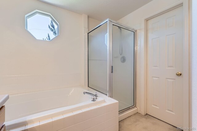 11803 E 114th Pl, Commerce City, CO 80640 - bathroom with a bath, a shower stall, and vanity