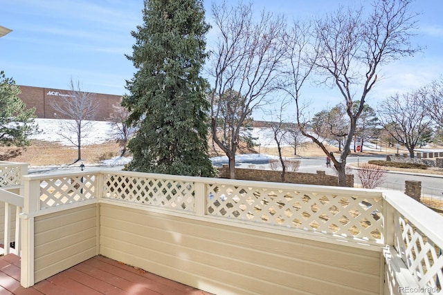 view of snow covered deck