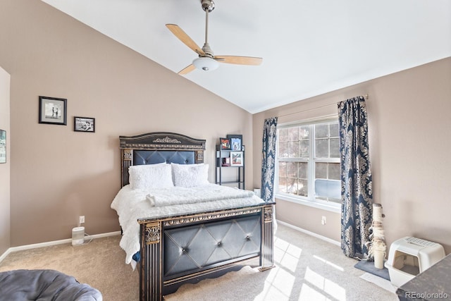 bedroom with vaulted ceiling, ceiling fan, light colored carpet, and baseboards