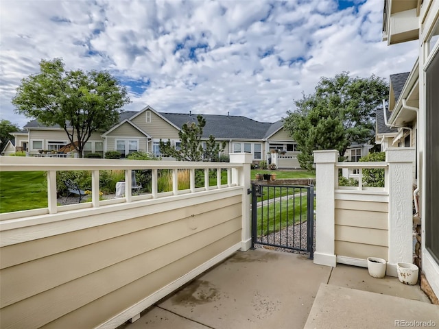 view of gate with a residential view