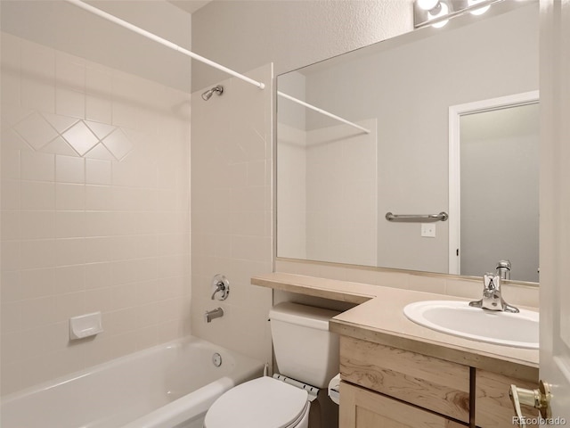 full bathroom featuring shower / bath combination, vanity, and toilet