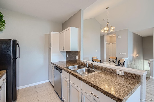 kitchen featuring white cabinetry, black refrigerator, dishwasher, kitchen peninsula, and sink