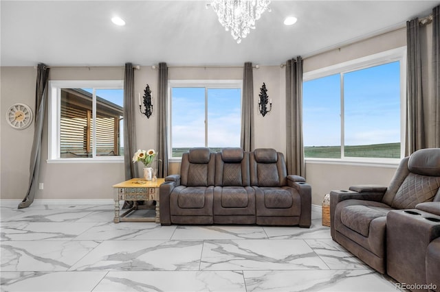 942 S County Road 129th Rd, Bennett, CO 80102 - living room with baseboards, recessed lighting, marble finish floor, and an inviting chandelier