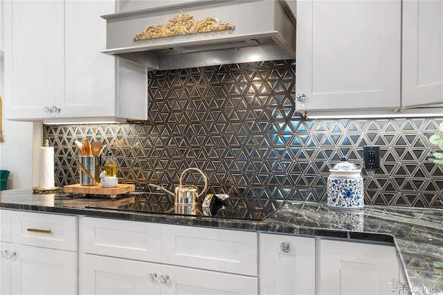 942 S County Road 129th Rd, Bennett, CO 80102 - kitchen with open shelves, decorative backsplash, white cabinetry, and premium range hood