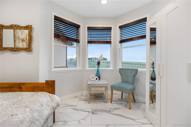 942 S County Road 129th Rd, Bennett, CO 80102 - bedroom with a water view, baseboards, multiple windows, and marble finish floor