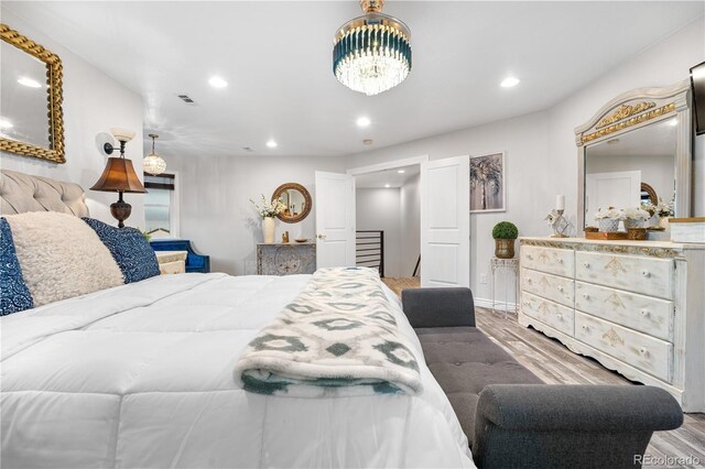 942 S County Road 129th Rd, Bennett, CO 80102 - bedroom with recessed lighting and wood finished floors