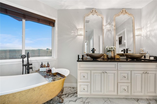 942 S County Road 129th Rd, Bennett, CO 80102 - bathroom featuring a sink, marble finish floor, and a healthy amount of sunlight