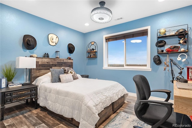 942 S County Road 129th Rd, Bennett, CO 80102 - bedroom with visible vents, recessed lighting, baseboards, and wood finished floors