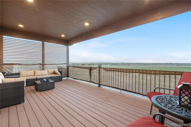 942 S County Road 129th Rd, Bennett, CO 80102 - wooden deck featuring an outdoor hangout area