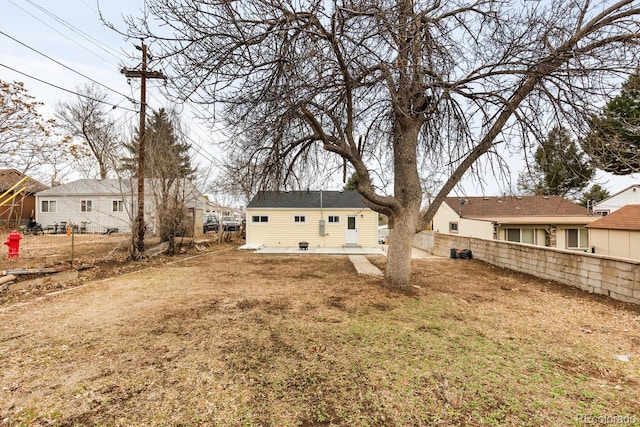 view of yard featuring a patio area and fence