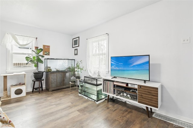 office featuring wood finished floors and baseboards