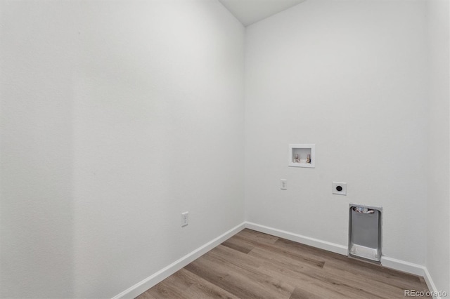 19040 E 96th Pl, Commerce City, CO 80022 - washroom featuring electric dryer hookup, hookup for a washing machine, light wood finished floors, and baseboards