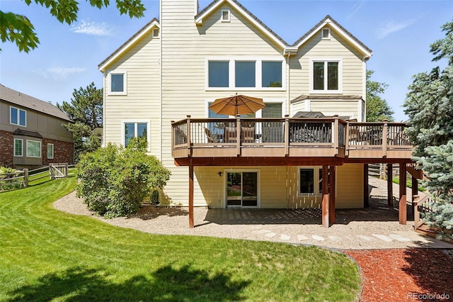 9556 Kemper Dr, Lone Tree, CO 80124 - back of house with a wooden deck, a chimney, and a patio