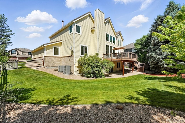 9556 Kemper Dr, Lone Tree, CO 80124 - back of house featuring stairway, a deck, a patio area, and a chimney