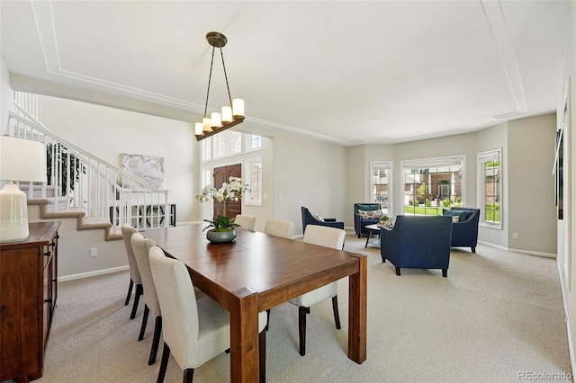 9556 Kemper Dr, Lone Tree, CO 80124 - dining area with light colored carpet and stairway