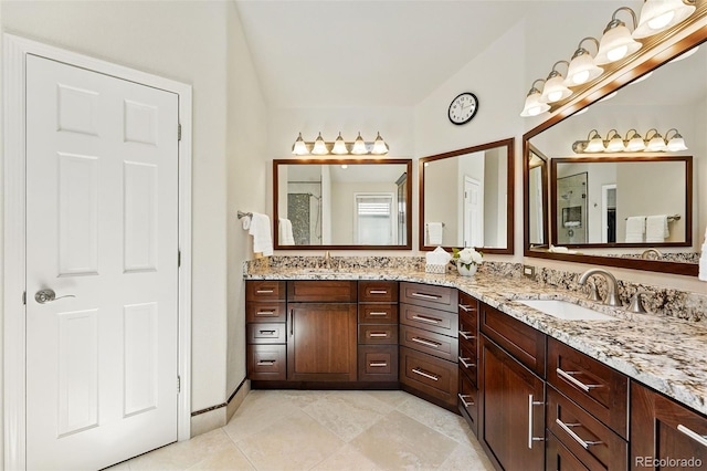 9556 Kemper Dr, Lone Tree, CO 80124 - bathroom with double vanity and tile patterned flooring
