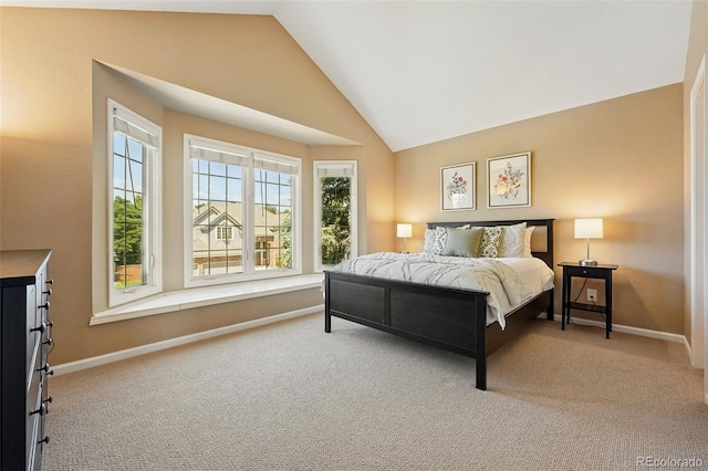 9556 Kemper Dr, Lone Tree, CO 80124 - carpeted bedroom with lofted ceiling and baseboards