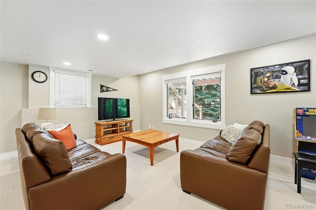 9556 Kemper Dr, Lone Tree, CO 80124 - living room featuring light colored carpet and recessed lighting