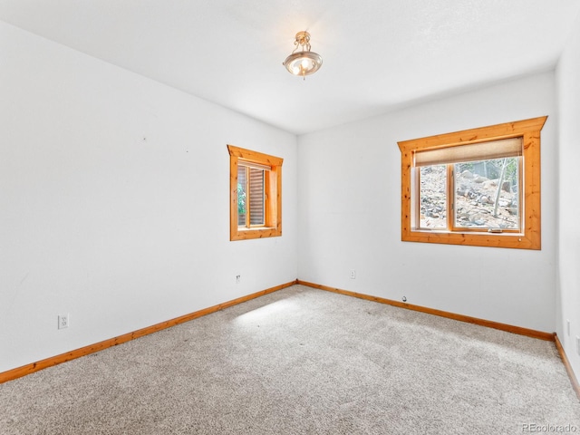 11766 Coal Creek Heights Dr, Golden, CO 80403 - spare room with carpet floors and baseboards