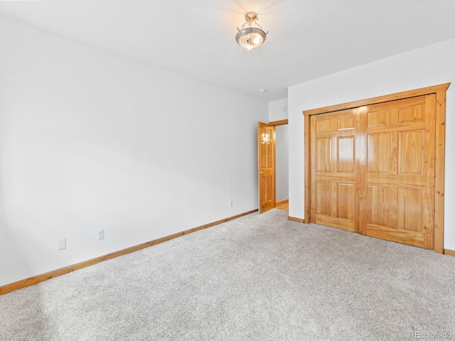 11766 Coal Creek Heights Dr, Golden, CO 80403 - unfurnished bedroom featuring carpet, baseboards, and a closet