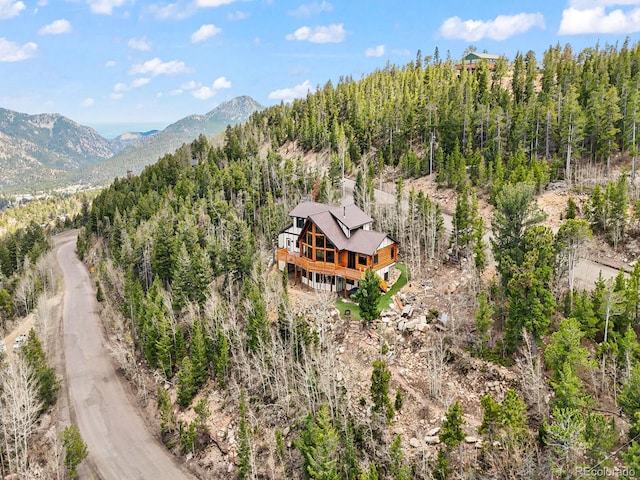 11766 Coal Creek Heights Dr, Golden, CO 80403 - view from above of property with a mountain backdrop and a forest