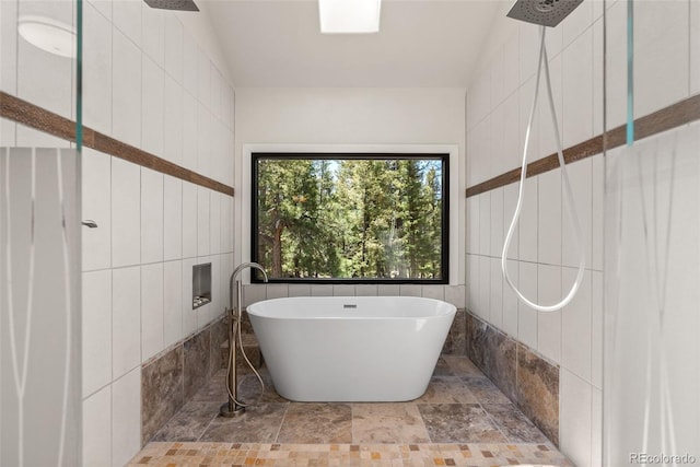 192 Nova Dr, Pine, CO 80470 - full bath with a freestanding tub and a tile shower